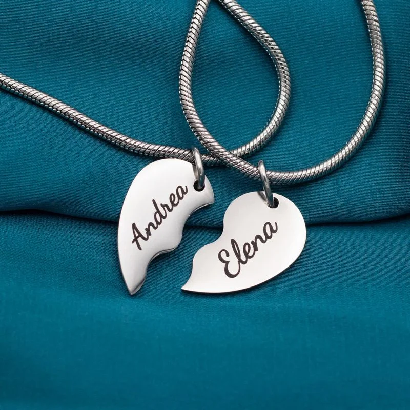 Collana Snake di Coppia in Acciaio Inox con Cuore Diviso